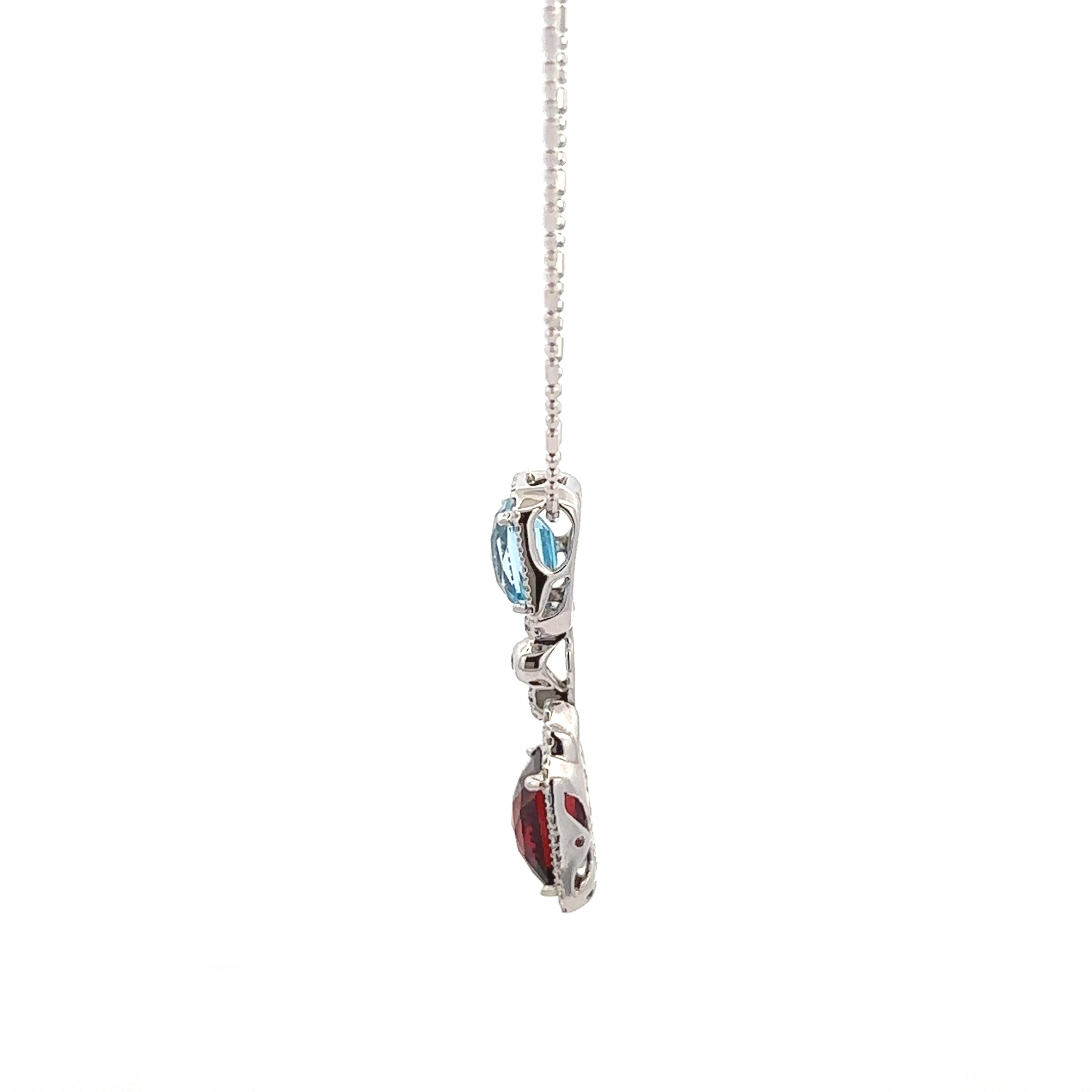 18k White Gold Swiss Blue & Mozambique White Diamonds Pendant