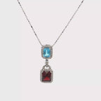 18k White Gold Swiss Blue & Mozambique White Diamonds Pendant